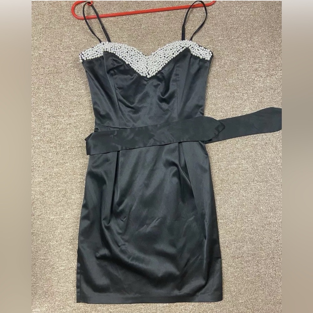 women's cocktail dress with straps and belt.